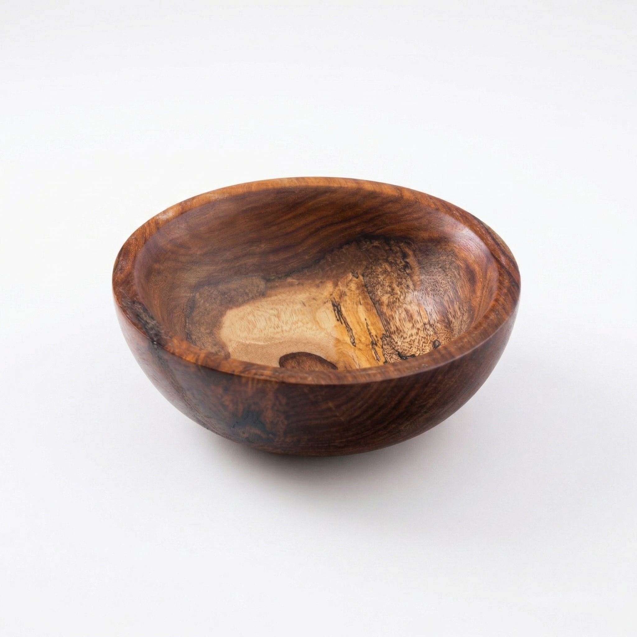 Set of wooden circular bowls